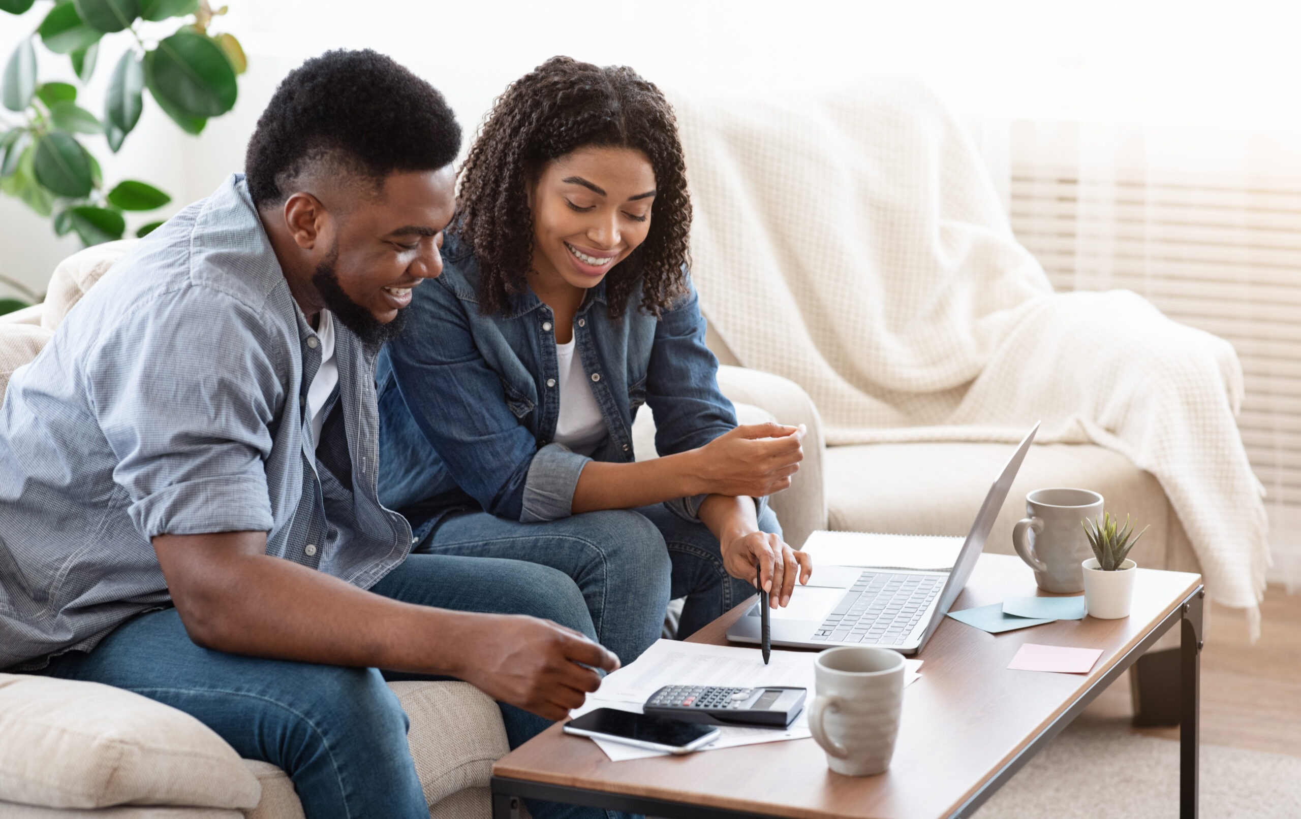 Household,Budget.,Smiling,Black,Couple,Discussing,Total,Amount,Of,Their