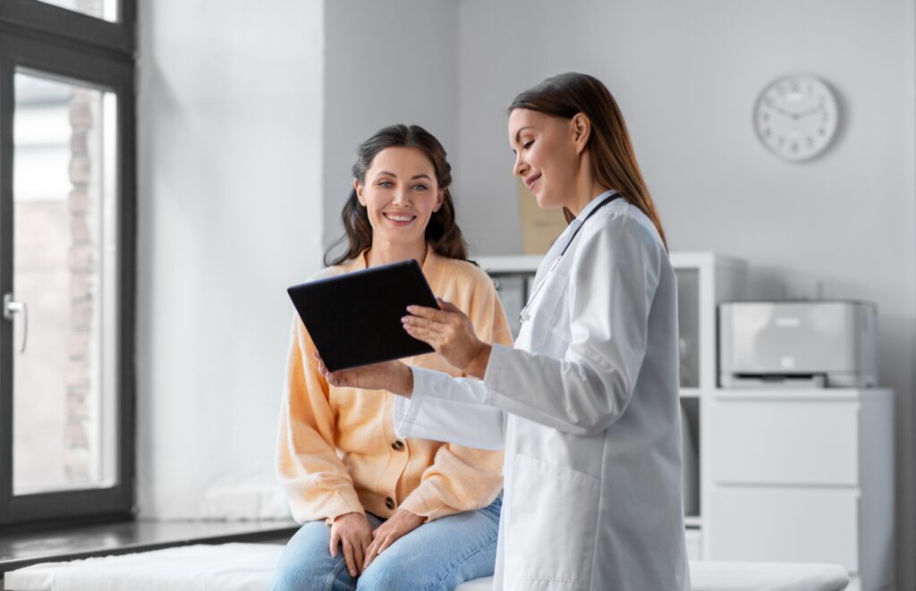 Medicine,,Healthcare,And,People,Concept,-,Female,Doctor,With,Tablet