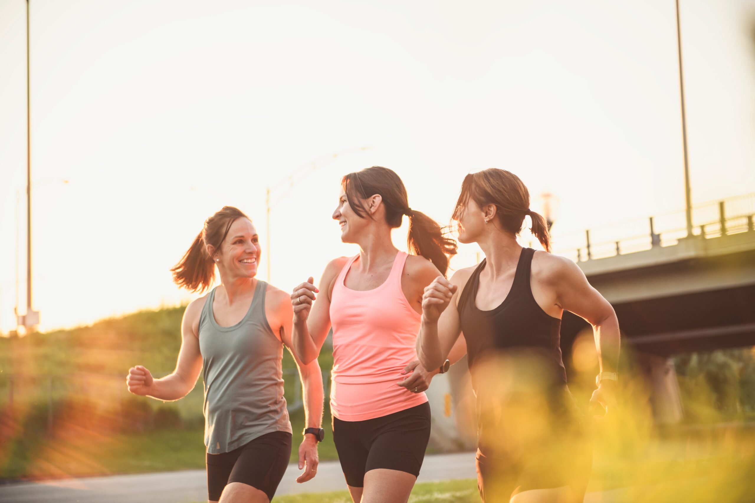 The,Females,In,Sportswear,Walking,Together,Bright,Sunny,Park,In