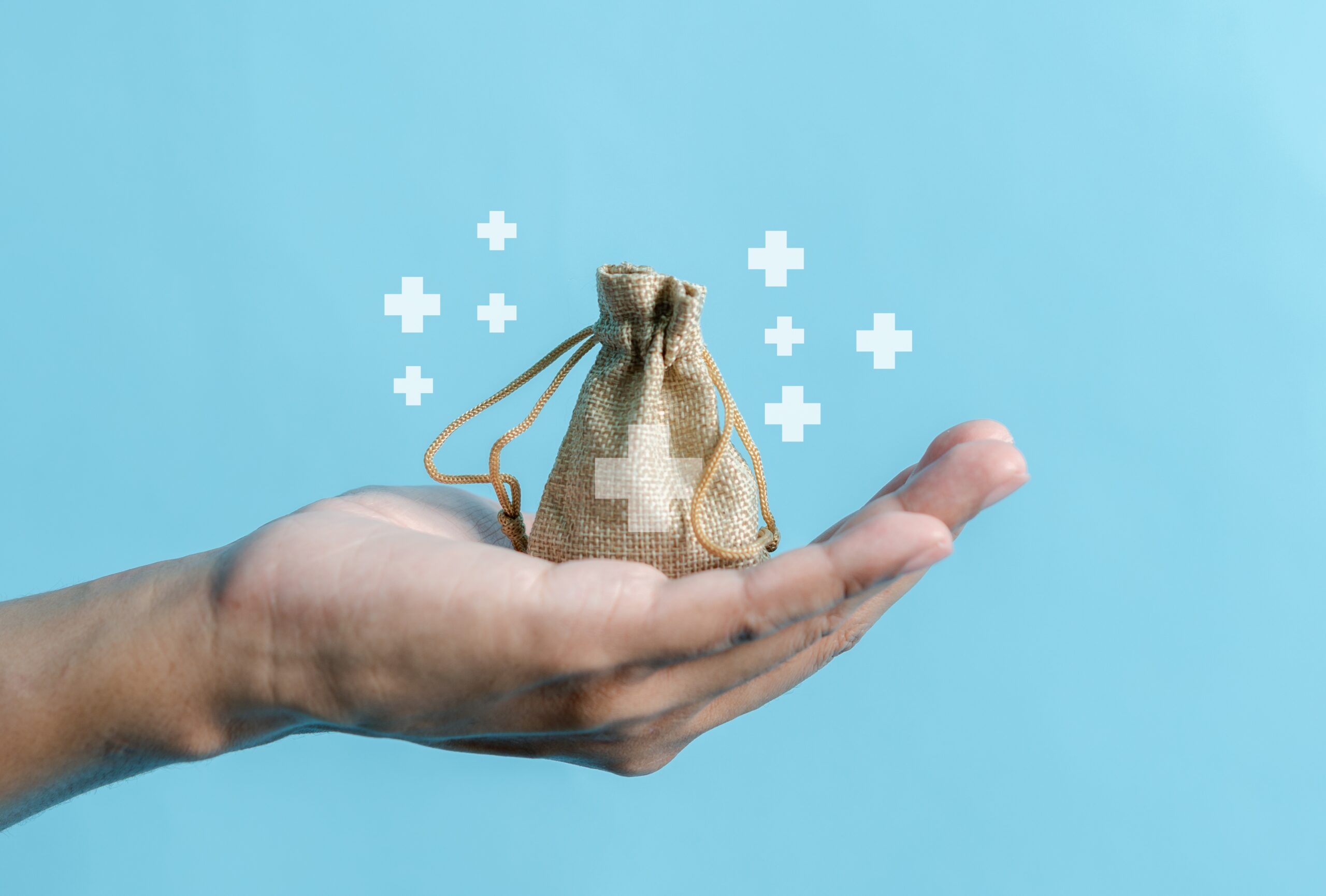 Health,Insurance,Concept.,People,Holding,Money,Bag,For,Buy,Insurance