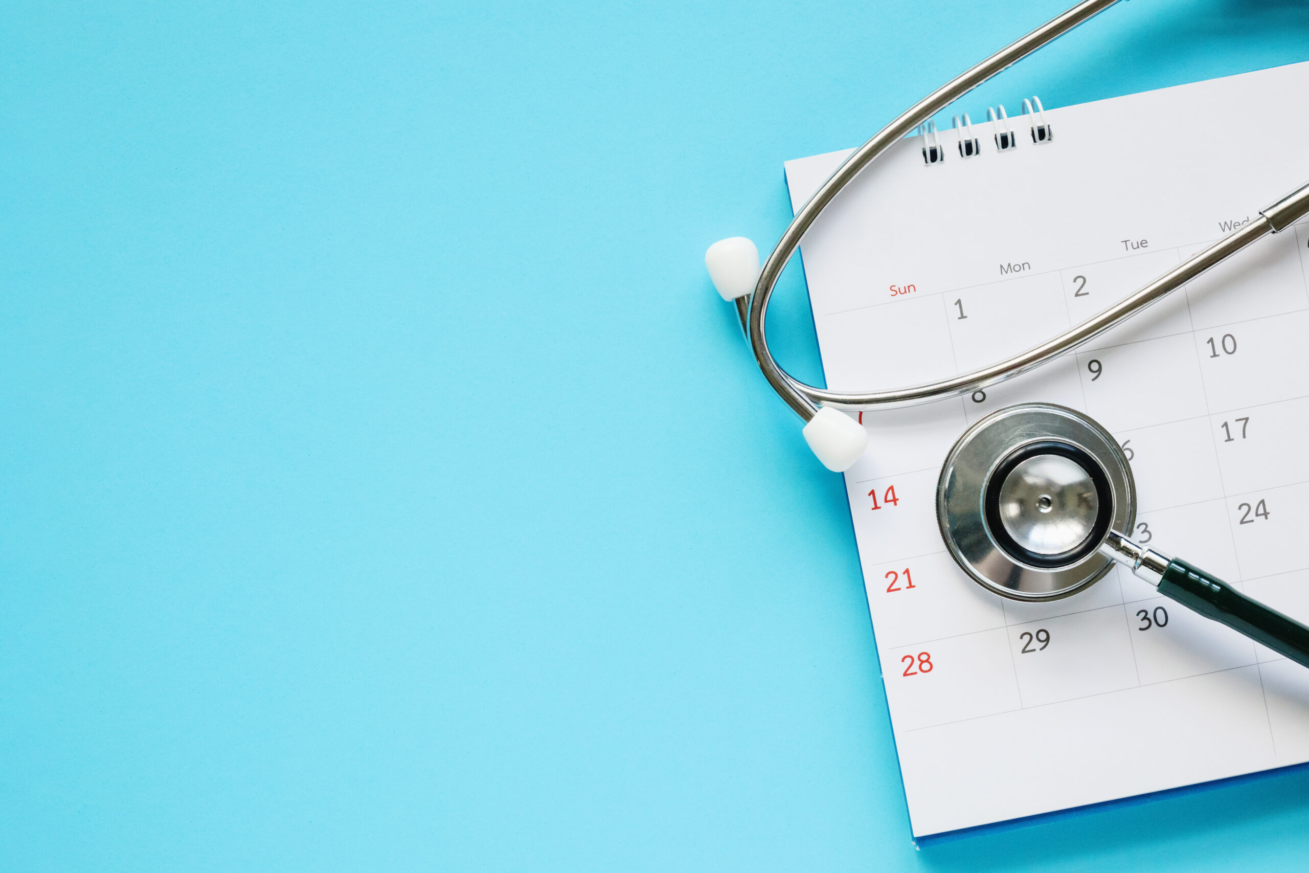Stethoscope,With,Calendar,Page,Date,On,Blue,Background,Doctor,Appointment