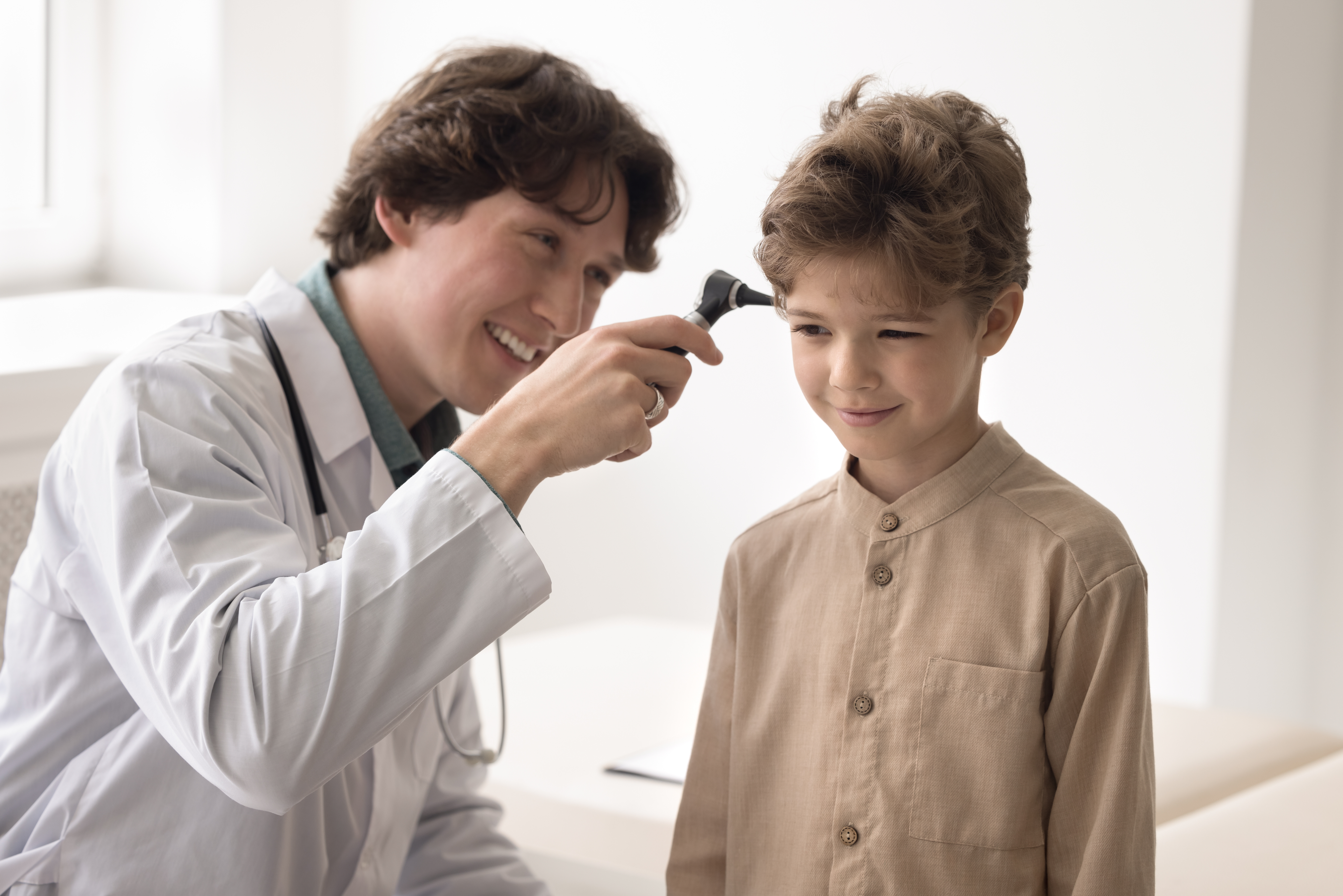 Good,Hearing.,Smiling,Millennial,Male,Doctor,Medical,Professional,Pediatrician,Ent