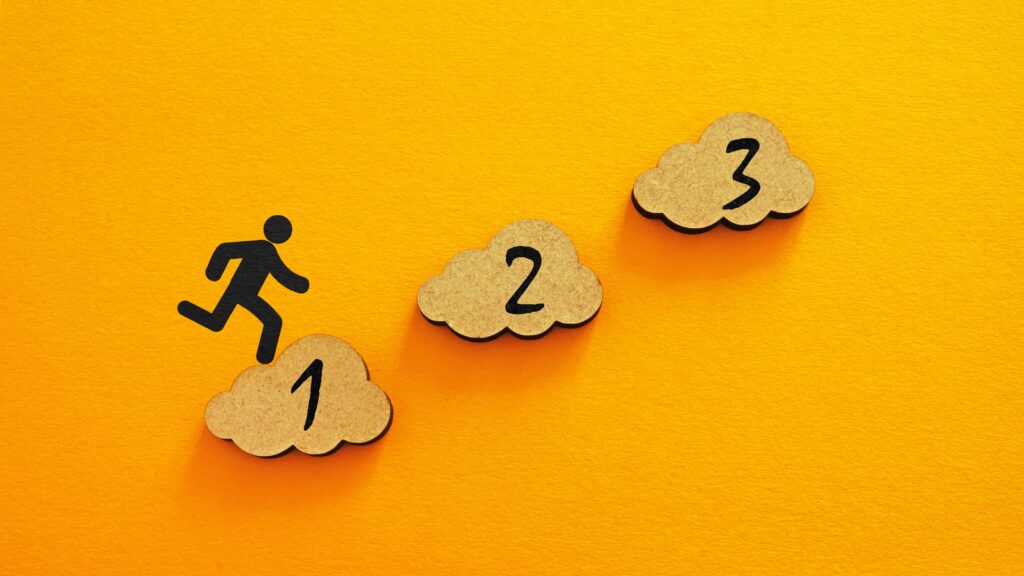 Choose your private health insurance tier in three easy steps. Illustration of stick figure leaping between 1 and 2, with step 3 just above.