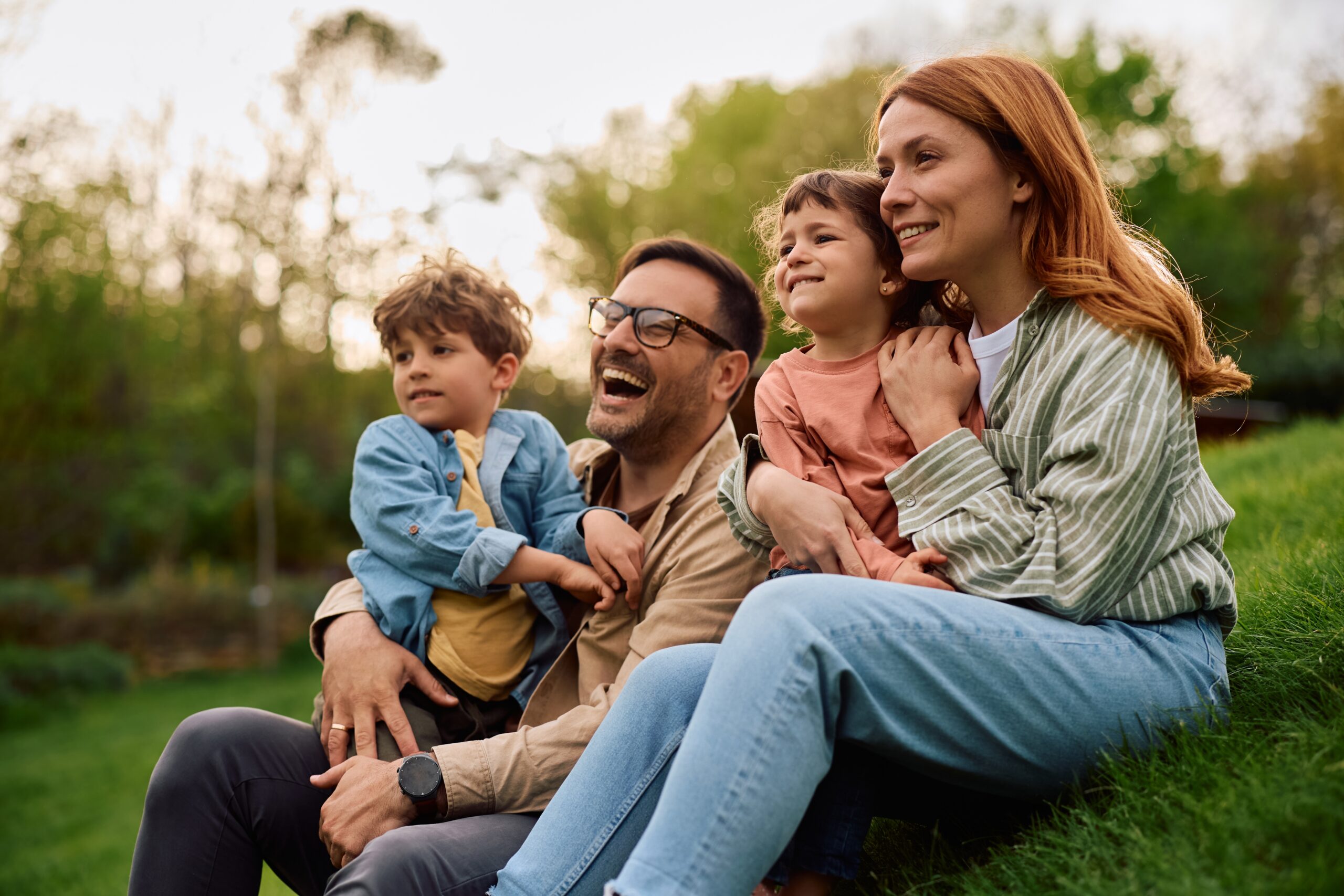 Happy,Family,Spending,Time,Together,At,The,Park,In,Springtime.